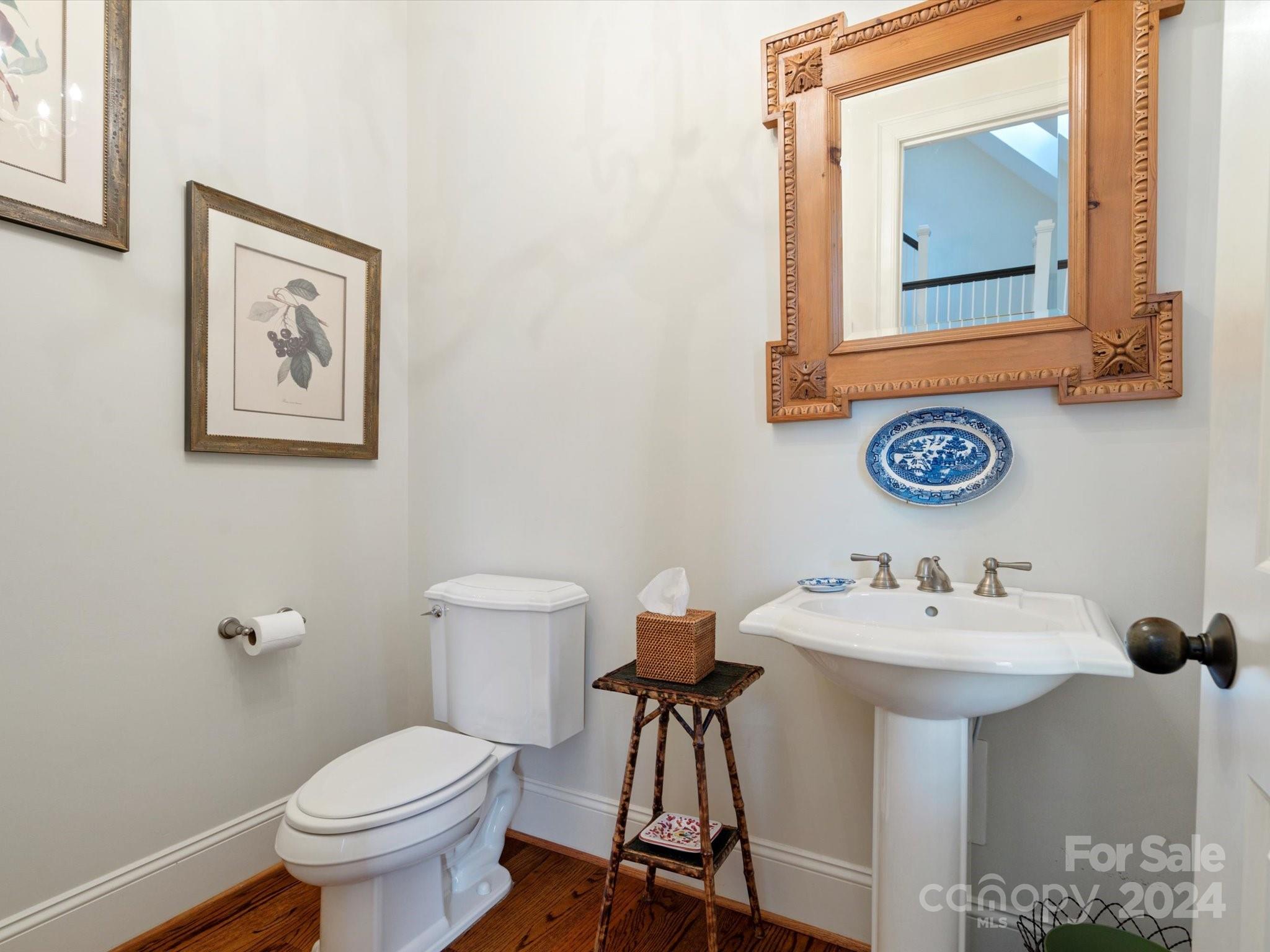 135 Spring Branch Road Fort Mill, SC 29715 - Photo 9 of 48 a bathroom with a toilet a sink and mirror