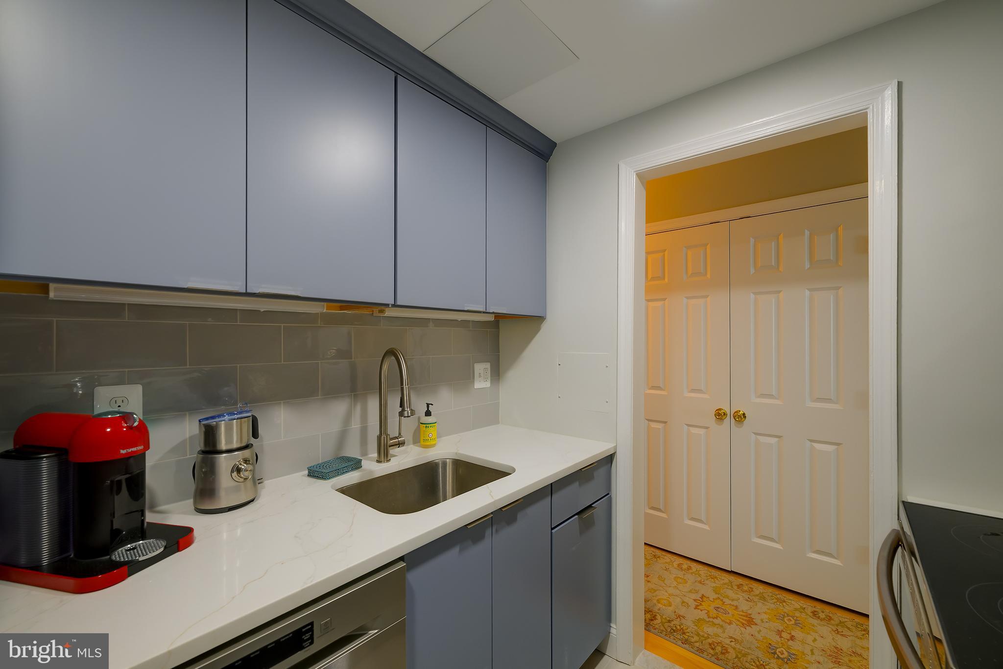 226 3rd Street Northeast, Unit 35 Washington, DC 20002 - Photo 11 of 19 a kitchen with sink and cabinets