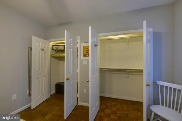 a view of a hallway with a room