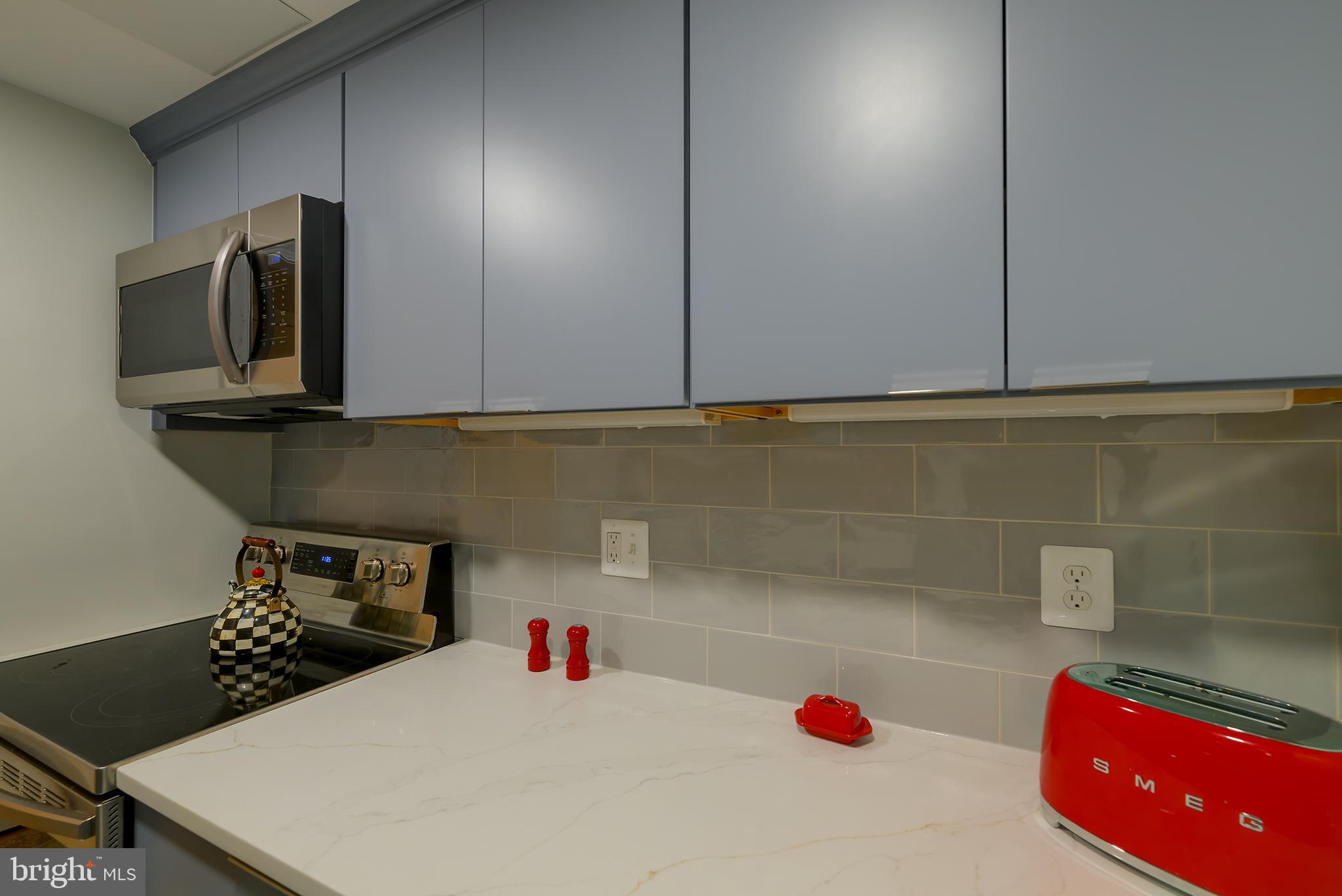 226 3rd Street Northeast, Unit 35 Washington, DC 20002 - Photo 10 of 19 a kitchen with a cabinets and appliances