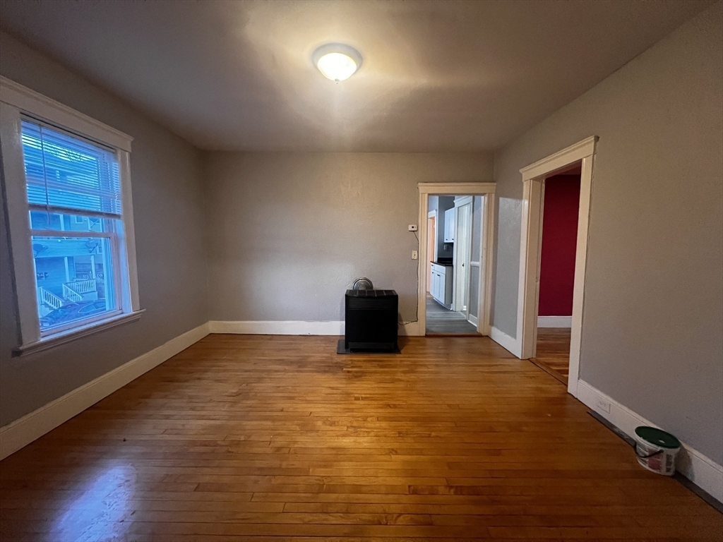 55 Vernon Street, Unit 2 Worcester, MA 01610 - Photo 5 of 10 a view of a livingroom with a furniture and window