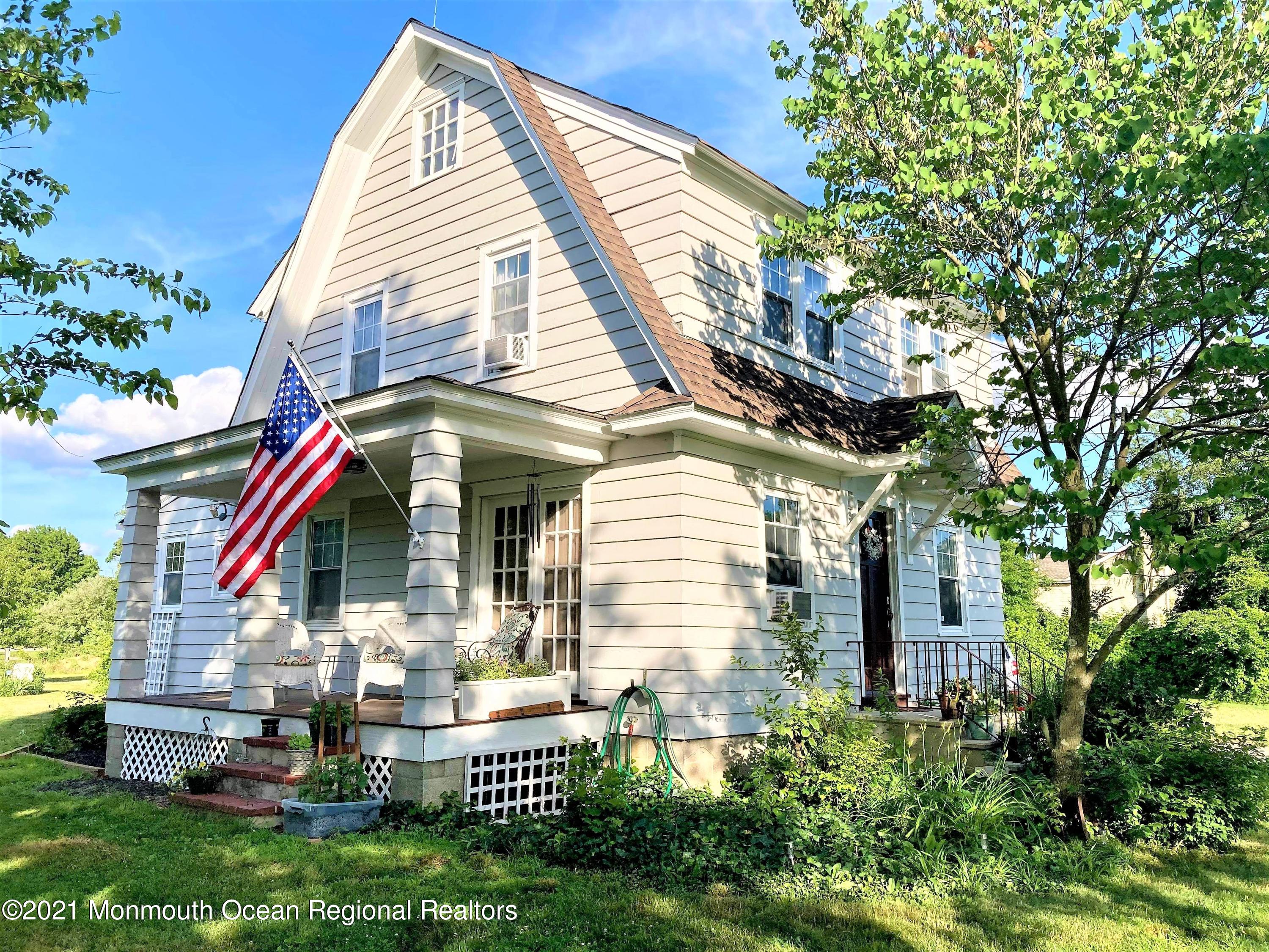 16 Province Line Road New Egypt, NJ 08533 - Photo 2 of 19 a front view of house with a garden and trees