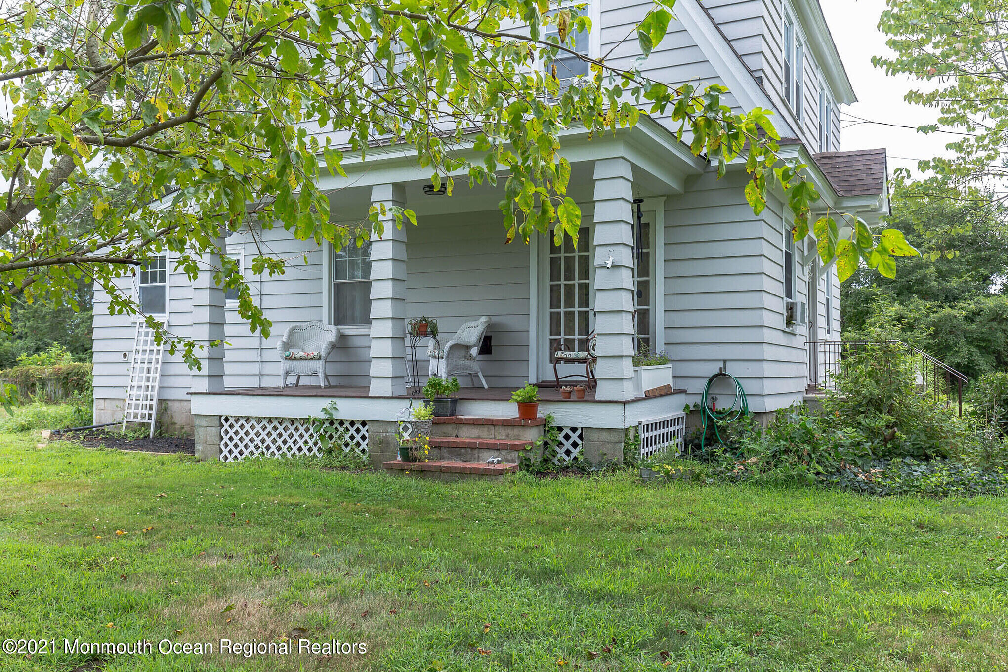 16 Province Line Road New Egypt, NJ 08533 - Photo 13 of 19 a front view of a house with a garden
