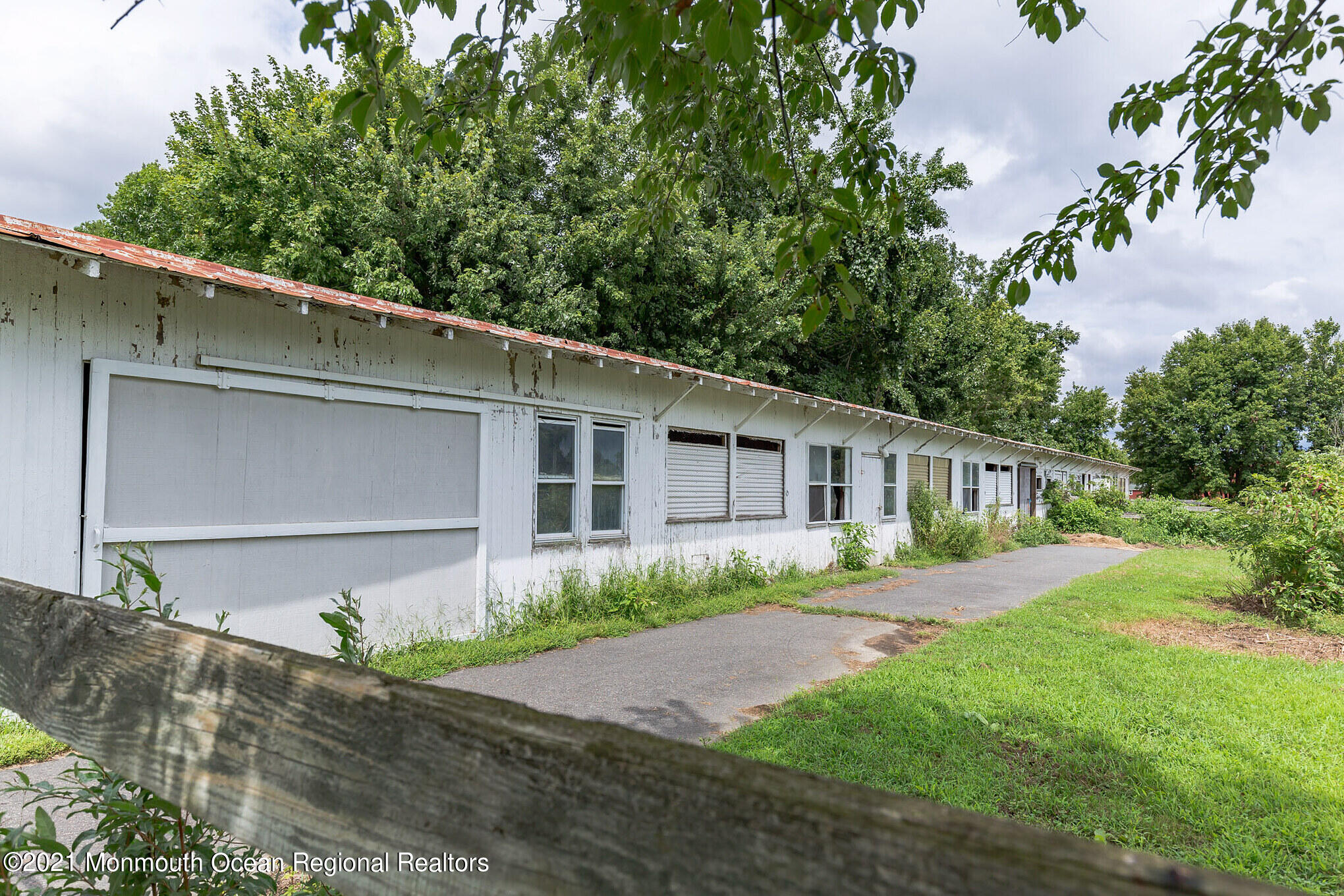16 Province Line Road New Egypt, NJ 08533 - Photo 18 of 19 a front view of house with yard and trees all around