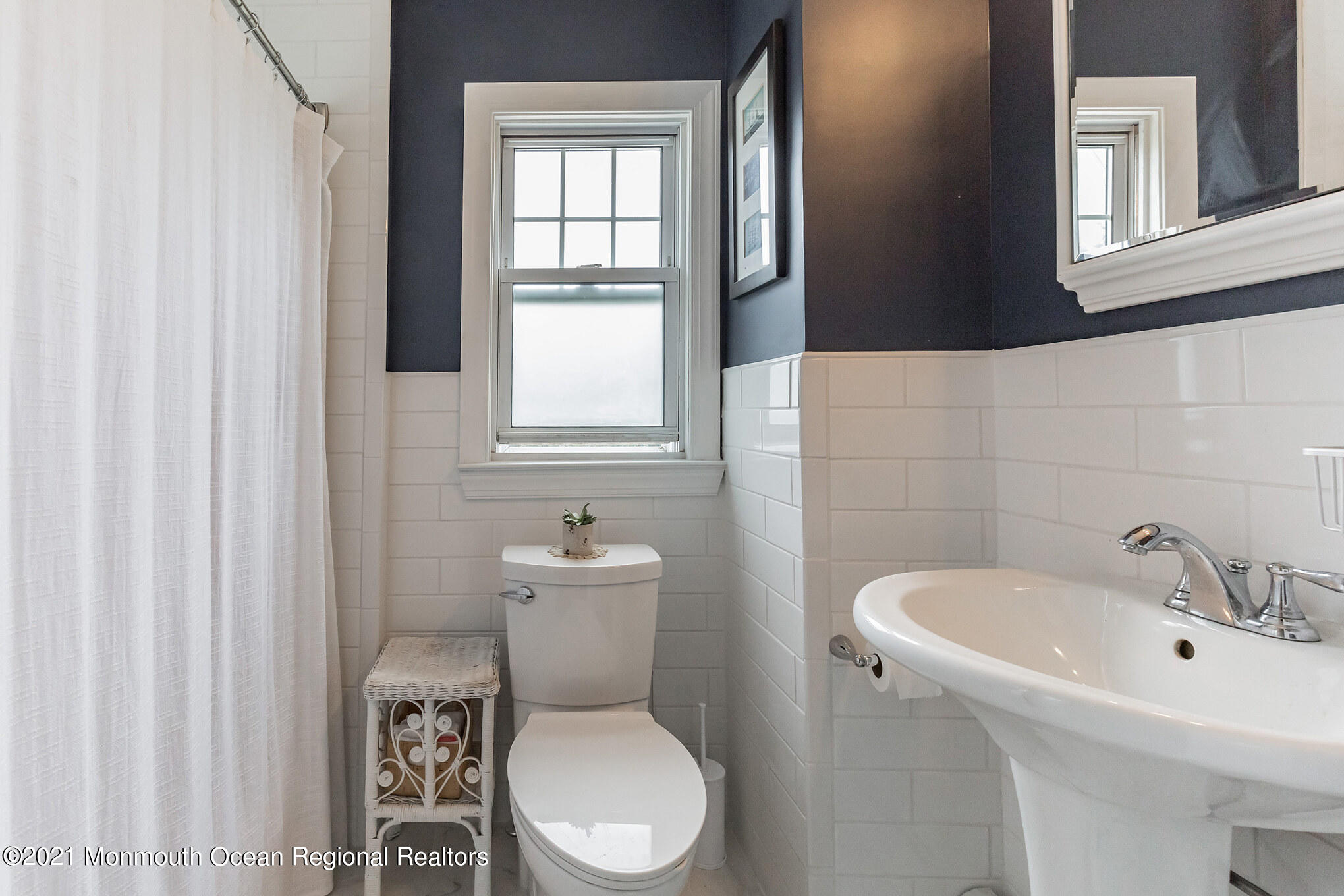 16 Province Line Road New Egypt, NJ 08533 - Photo 10 of 19 a bathroom with a toilet a sink and a window
