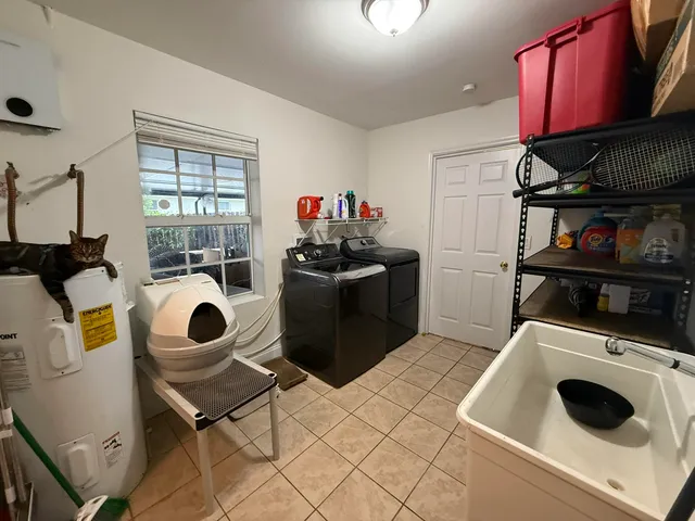 $895,900 | 1613 Sherwood Avenue, Mangonia Park, FL 33407