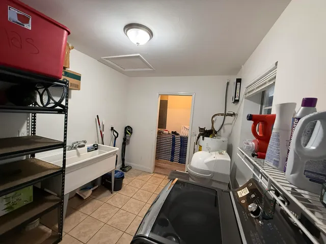 $895,900 | 1613 Sherwood Avenue, Mangonia Park, FL 33407