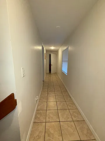 a work room with furniture and musical instruments
