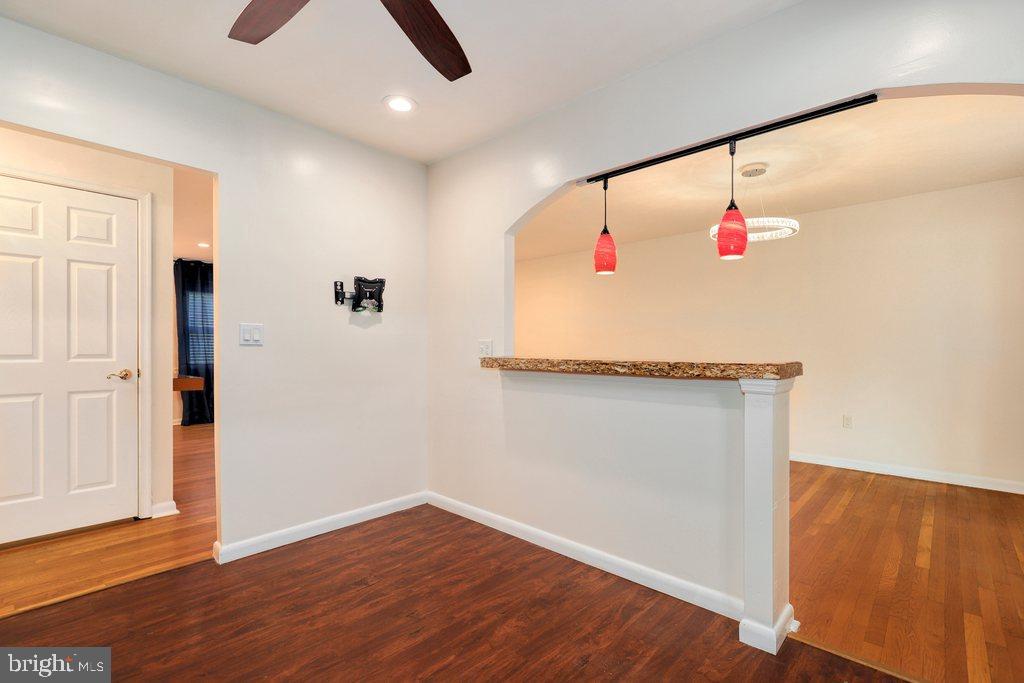 8538 Brest Road Randallstown, MD 21133 - Photo 19 of 47 wooden floor in an empty room