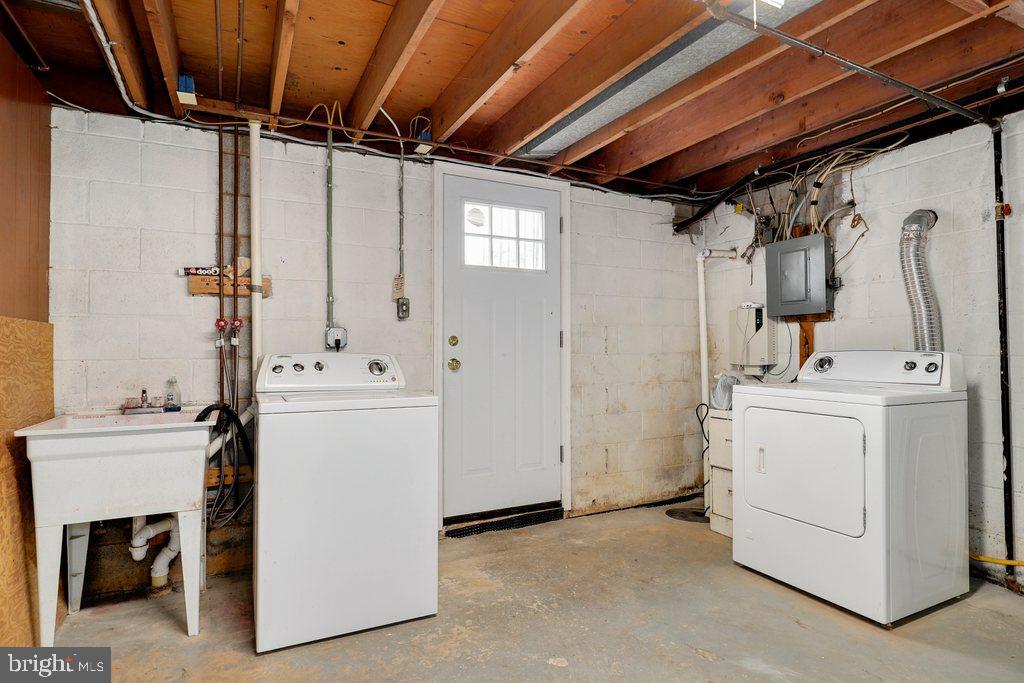 8538 Brest Road Randallstown, MD 21133 - Photo 40 of 47 a utility room with dryer and washer