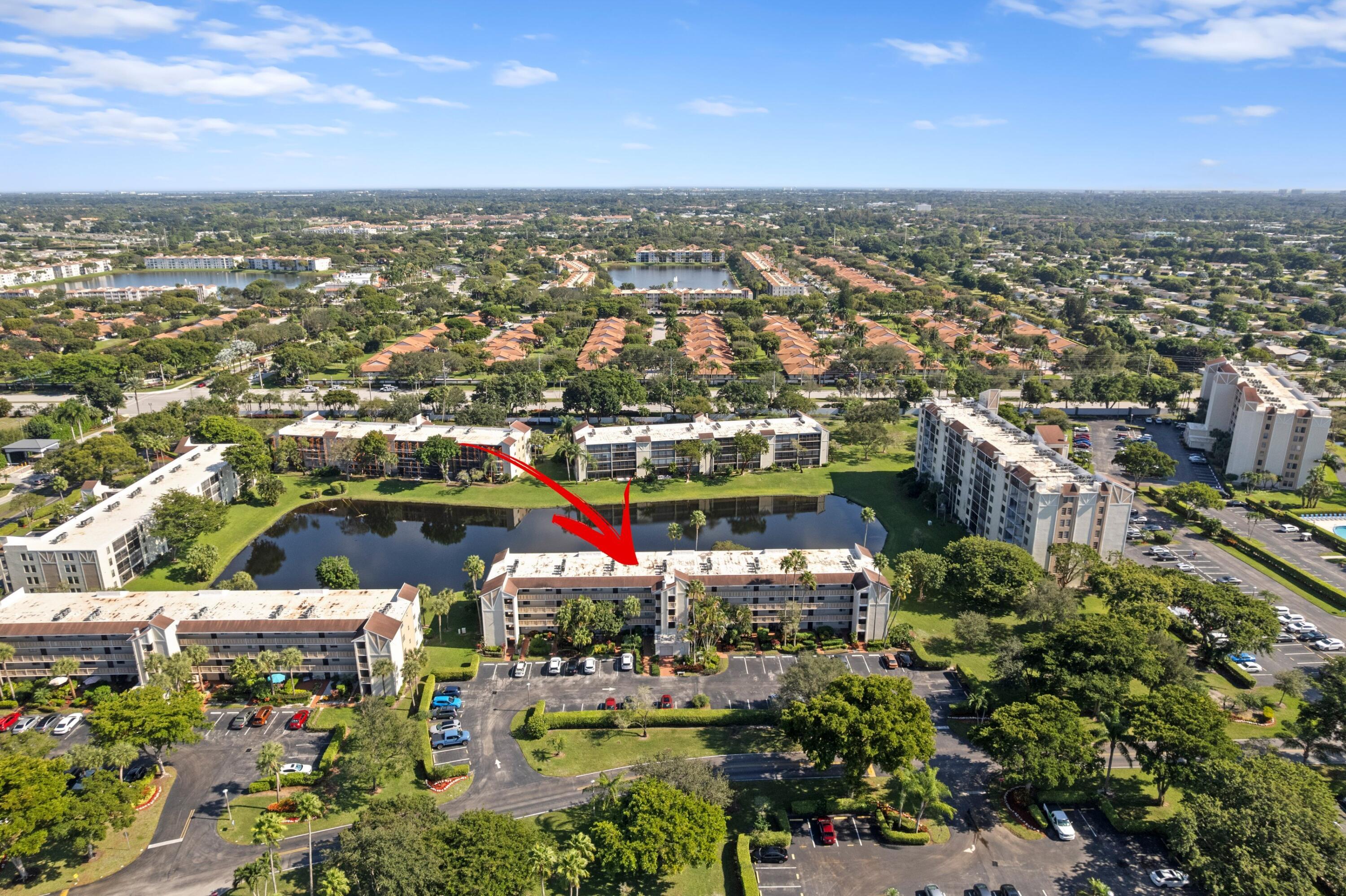 14360 Strathmore Lane, Unit 404 Delray Beach, FL 33446 - Photo 20 of 42 an aerial view of multiple house