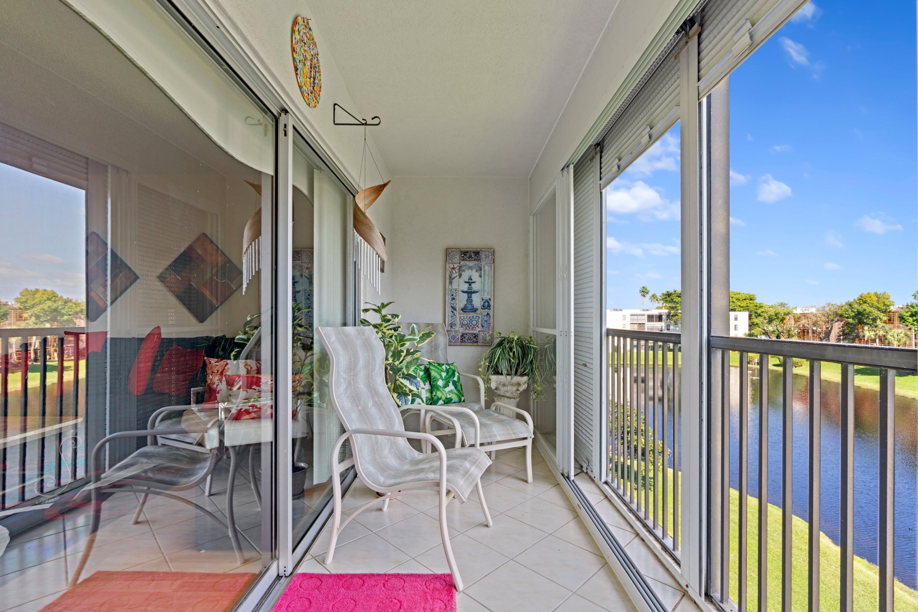 14360 Strathmore Lane, Unit 404 Delray Beach, FL 33446 - Photo 6 of 42 a view of balcony with furniture