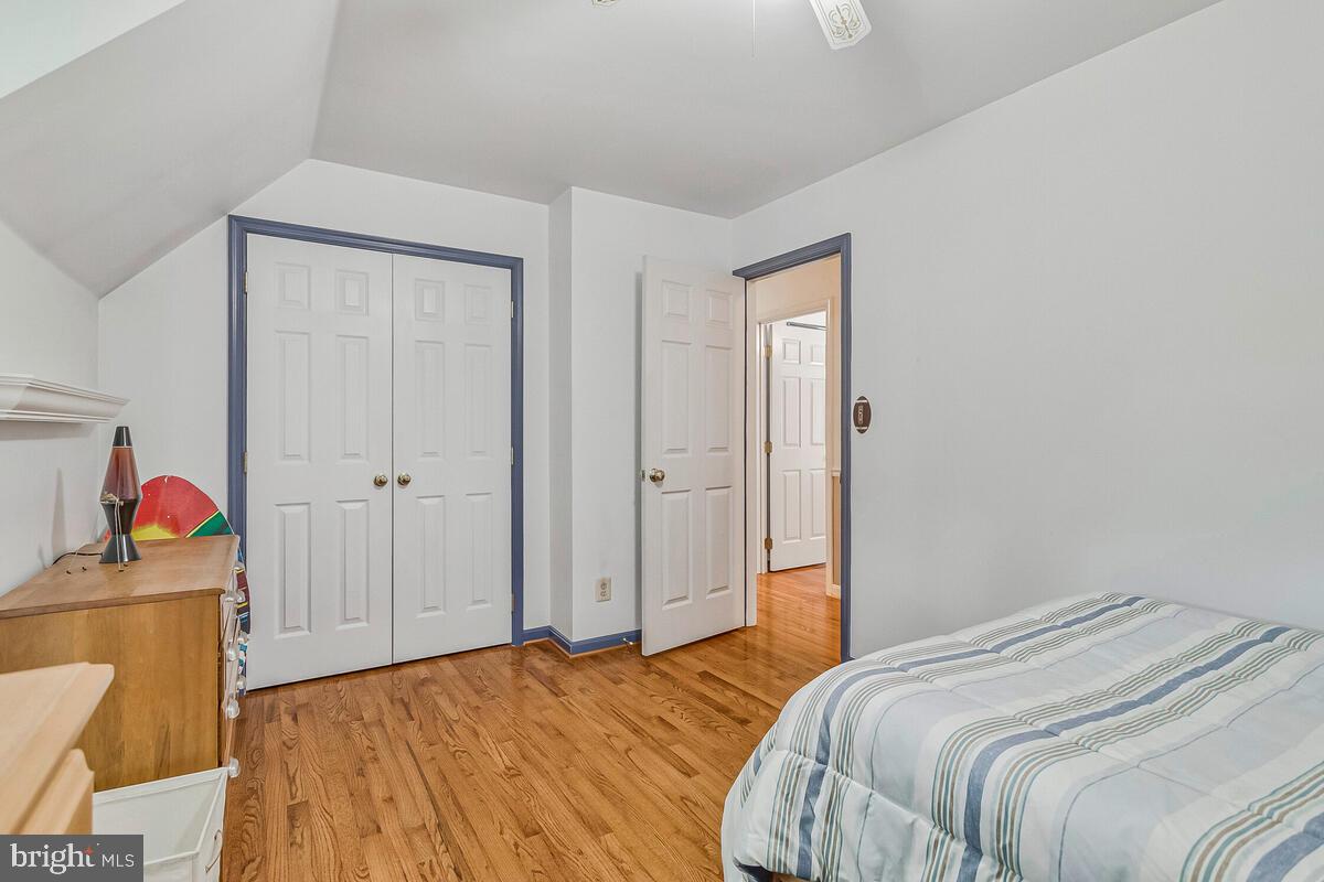 3897 Hunting Creek Road Huntingtown, MD 20639 - Photo 37 of 75 a bedroom with a bed and utility room