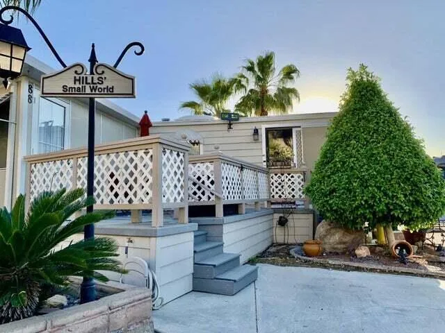 a view of a chairs and table in a patio