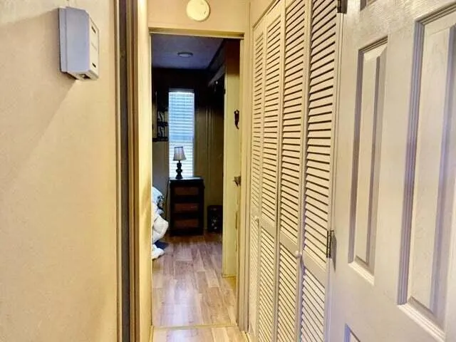 a bathroom with a toilet and a shower curtain