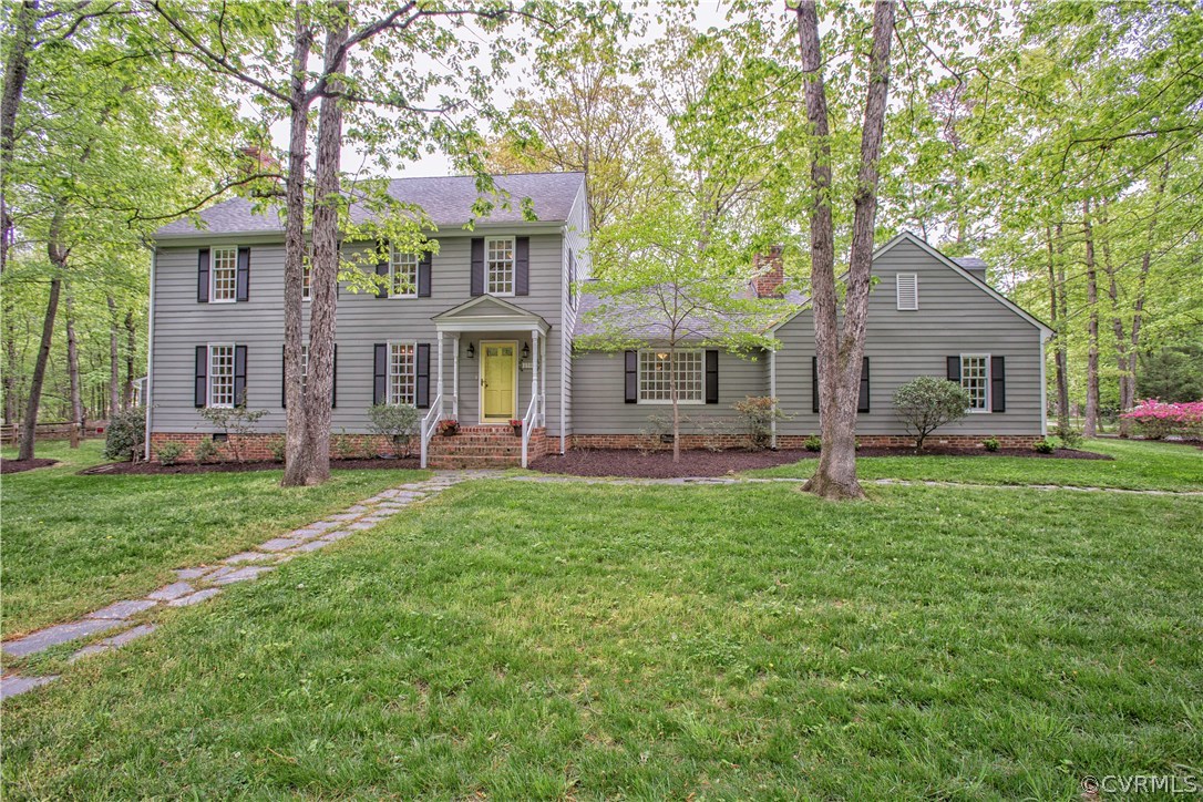 2701 East Brigstock Road Midlothian, VA 23113 - Photo 1 of 50 front view of a house with a yard