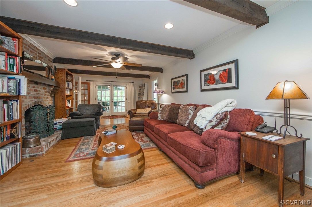 2701 East Brigstock Road Midlothian, VA 23113 - Photo 11 of 50 a living room with furniture and a lamp