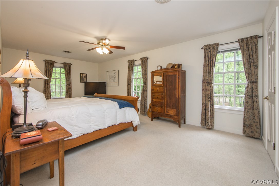2701 East Brigstock Road Midlothian, VA 23113 - Photo 27 of 50 a bed room with a bed and a lamp