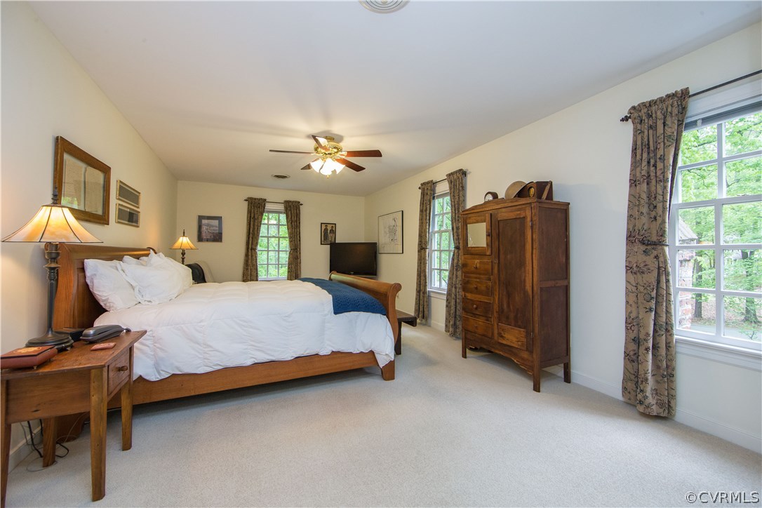 2701 East Brigstock Road Midlothian, VA 23113 - Photo 29 of 50 a bed room with a bed and a chandelier