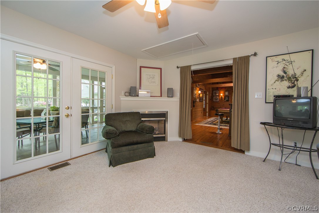 2701 East Brigstock Road Midlothian, VA 23113 - Photo 40 of 50 a living room with furniture and a window