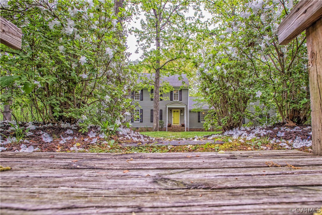 2701 East Brigstock Road Midlothian, VA 23113 - Photo 4 of 50 a front view of a house with a garden