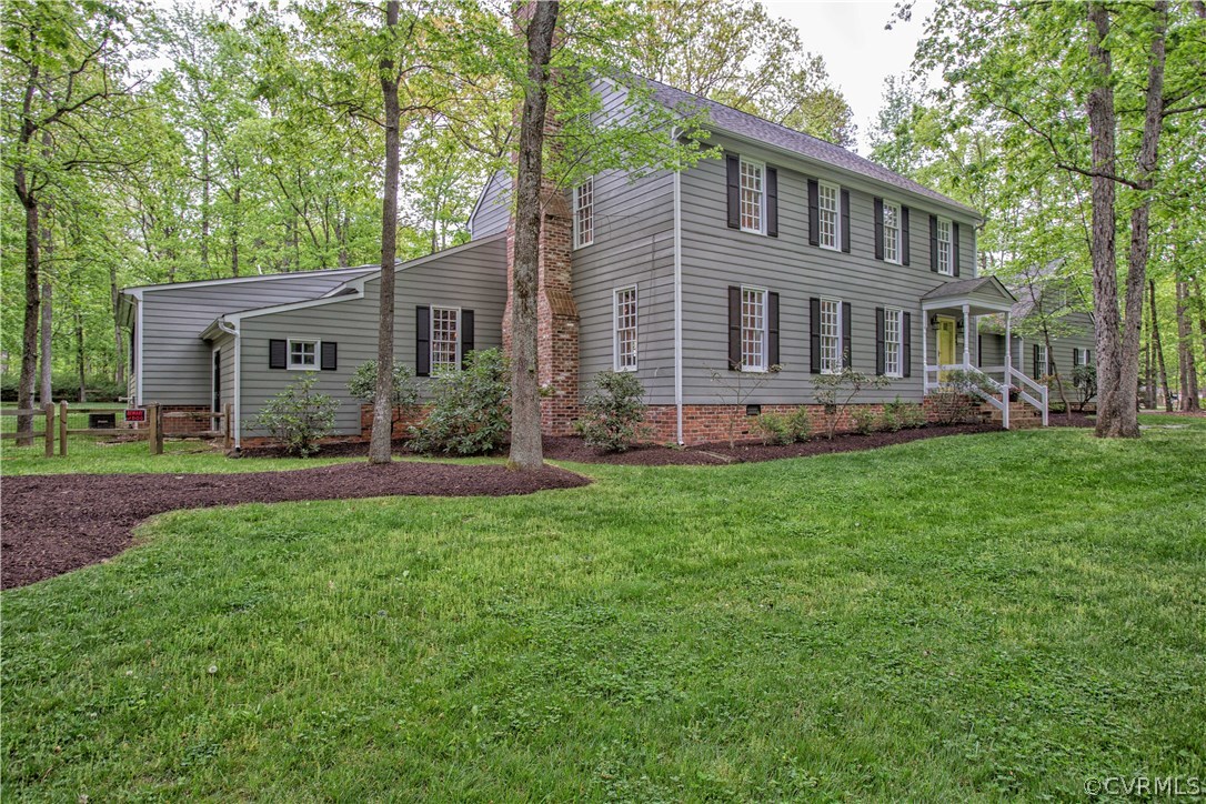 2701 East Brigstock Road Midlothian, VA 23113 - Photo 6 of 50 a front view of house with yard and green space