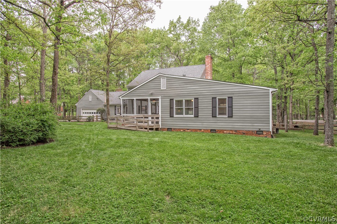 2701 East Brigstock Road Midlothian, VA 23113 - Photo 9 of 50 a view of a house with a backyard