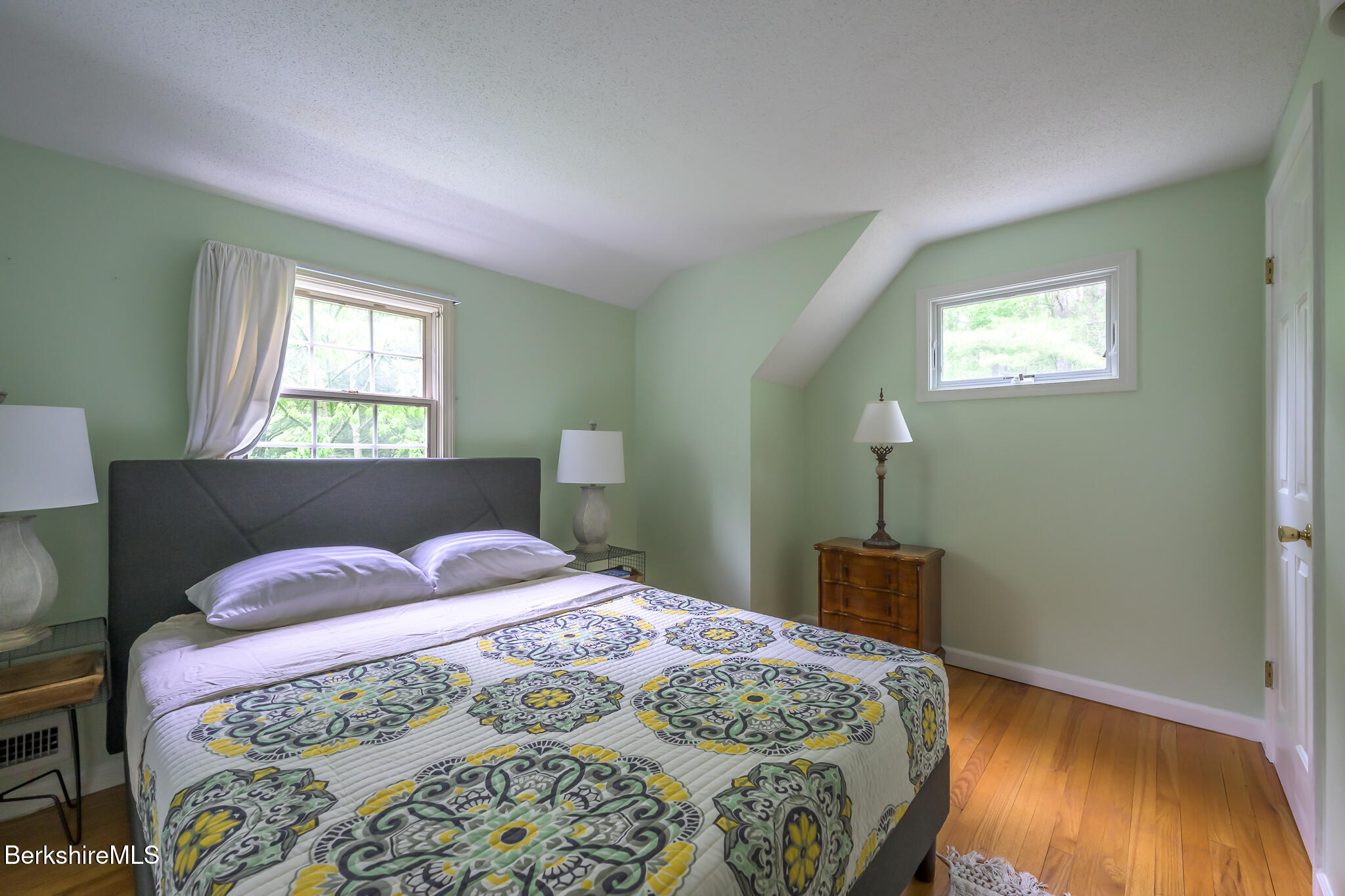 29 Osceola Notch Road Richmond, MA 01254 - Photo 23 of 32 a bedroom with a bed and wooden floor