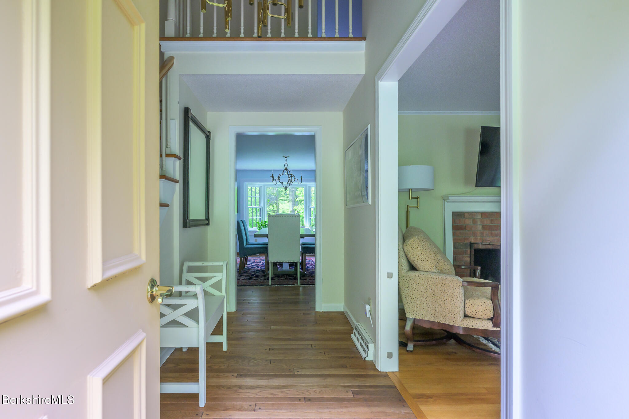 29 Osceola Notch Road Richmond, MA 01254 - Photo 5 of 32 a view of a hallway with a livingroom and dining room with furniture