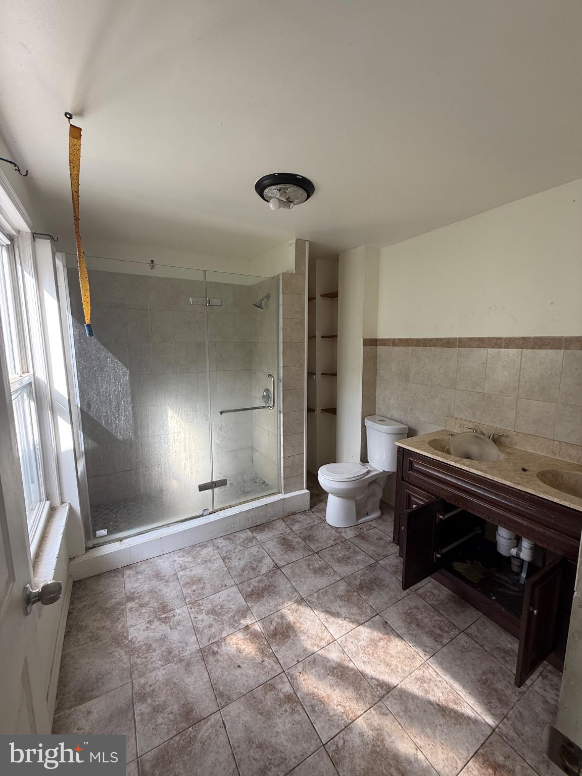 446 Spring Garden Street Reading, PA 19602 - Photo 5 of 9 Spacious bathroom with modern shower design.