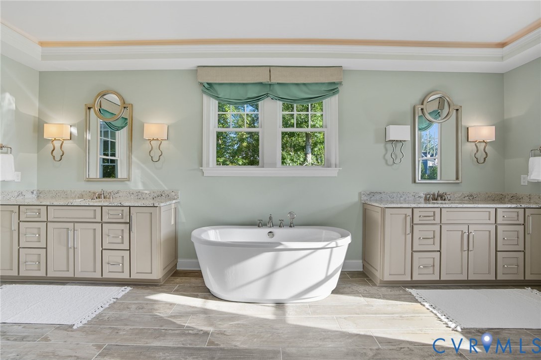 1931 Muswell Court Midlothian, VA 23112 - Photo 28 of 50 a spacious bathroom with a granite countertop sink mirror and bathtub