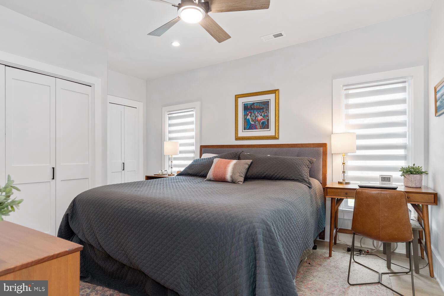 207 Dodson Avenue St. Michaels, MD 21663 - Photo 18 of 44 a bedroom with a bed and a chair