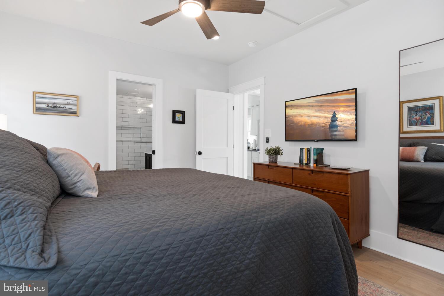 207 Dodson Avenue St. Michaels, MD 21663 - Photo 20 of 44 a bedroom with a bed and a flat screen tv