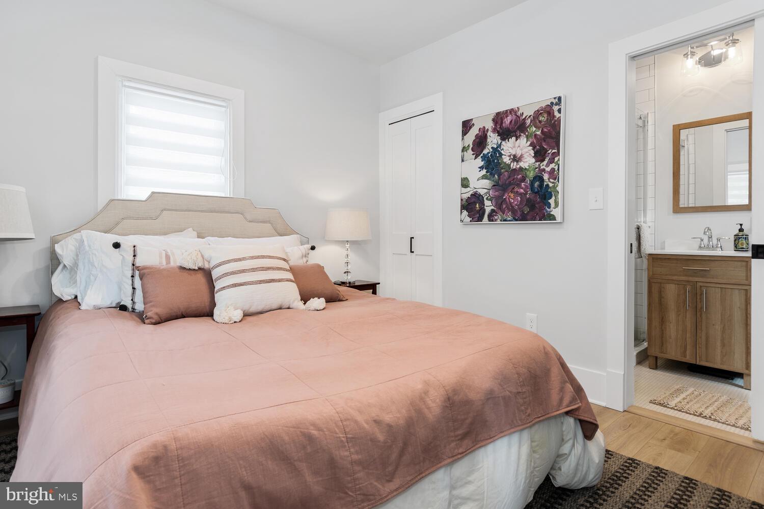 207 Dodson Avenue St. Michaels, MD 21663 - Photo 22 of 44 a bedroom with a bed and a view of kitchen