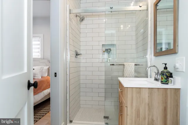 a bathroom with a sink and a shower