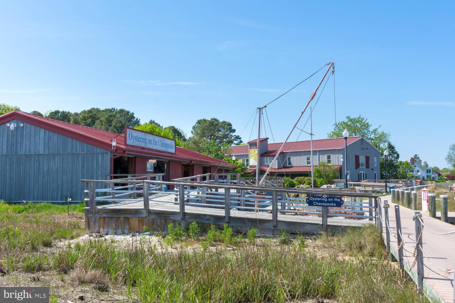 207 Dodson Avenue St. Michaels, MD 21663 - Photo 35 of 44 a swimming pool with outdoor seating and yard