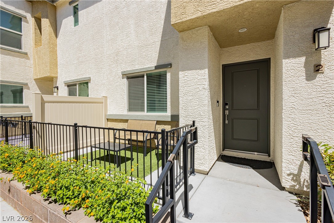 12369 Golden Wreath Road, Unit 2 Las Vegas, NV 89183 - Photo 2 of 19 A private entry courtyard welcomes you home to this contemporary residence with its inviting outdoor space.