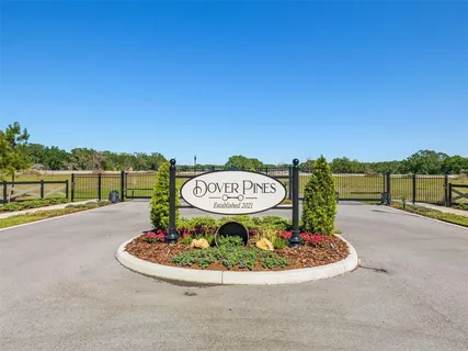a view of a street with a ocean view
