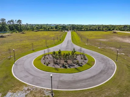 a view of a swimming pool with an ocean view