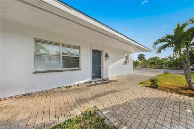 a view of a backyard of the house