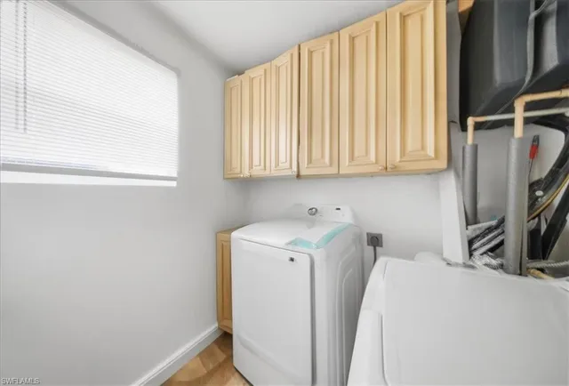a kitchen with stainless steel appliances granite countertop a sink and a stove