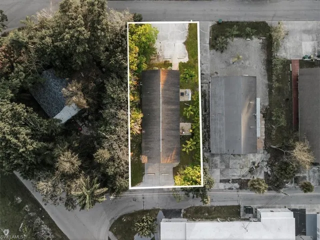 an aerial view of a house with a garden
