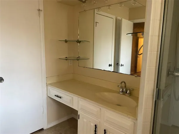 a bathroom with a sink and a tub