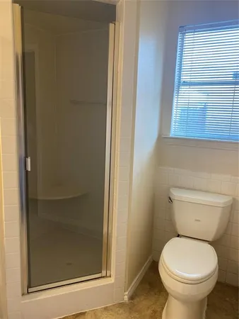 a bathroom with a toilet