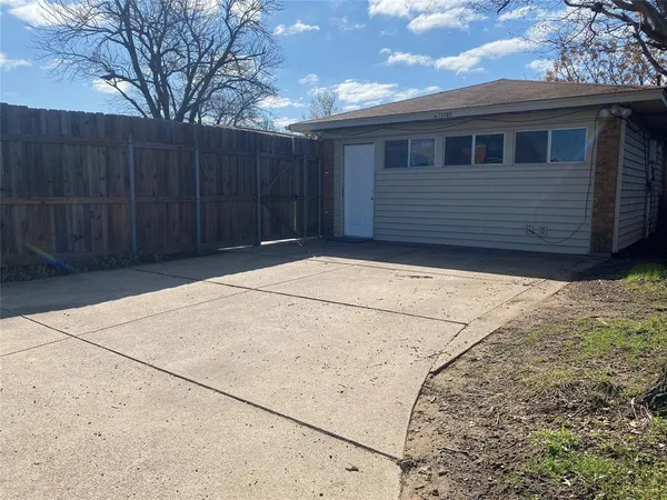 a view of backyard of house