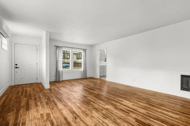 a view of an empty room and window