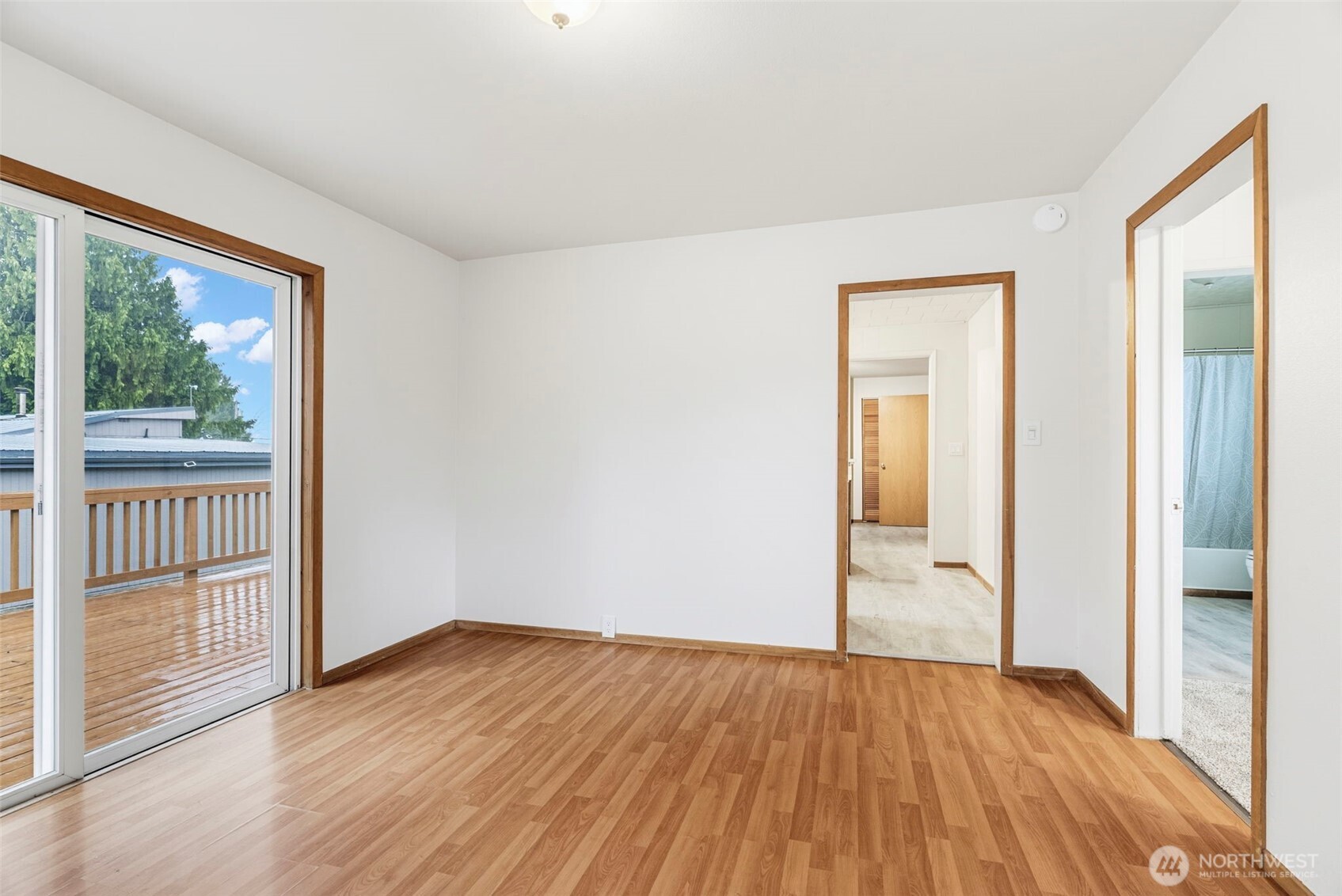 175 Jacobson Road Cathlamet, WA 98612 - Photo 19 of 32 wooden floor in an empty room with a window