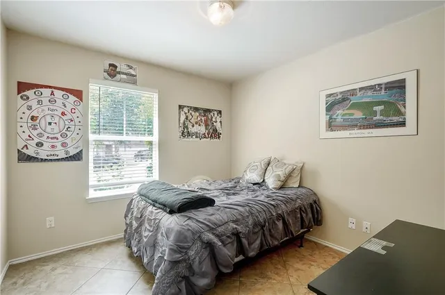 a view of a house with a yard and a garden