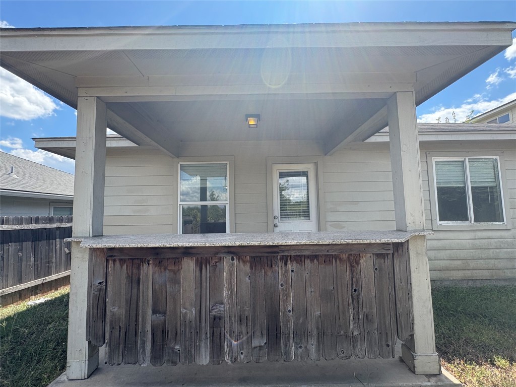 18316 Great Falls Drive Manor, TX 78653 - Photo 24 of 25 a view of wooden floor and a window