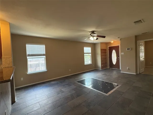 a view of a livingroom with a window